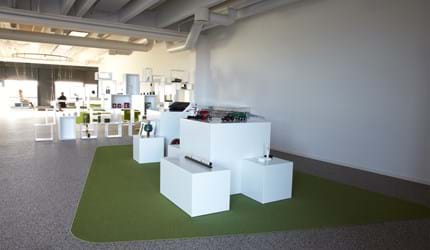 afpasset Fraster tæppe grøn på kontor